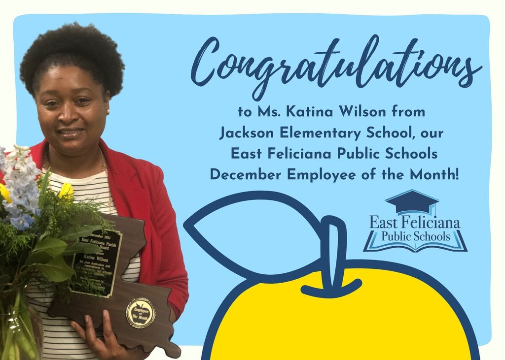 A woman wearing a red suit jacket is holding yellow and blue flowers and a plaque shaped like Louisiana. She stands in front of a light blue backdrop with a cartoon yellow apple and the East Feliciana Public Schools graduation cap logo. Text on the background reads "Congratulations to Ms. Katina Wilson from Jackson Elementary School, our East Feliciana Public Schools December Employee of the Month!