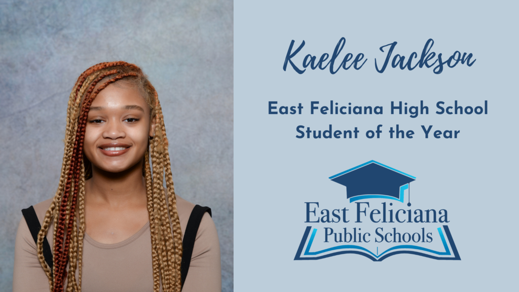 A young person in a tan shirt with black stripes smiles in front of a portrait backdrop. To the right of her is the East Feliciana Public Schools graduation cap logo and his name and title: Kaelee Jackson, East Feliciana Public Schools 12th Grade Student of the Year.