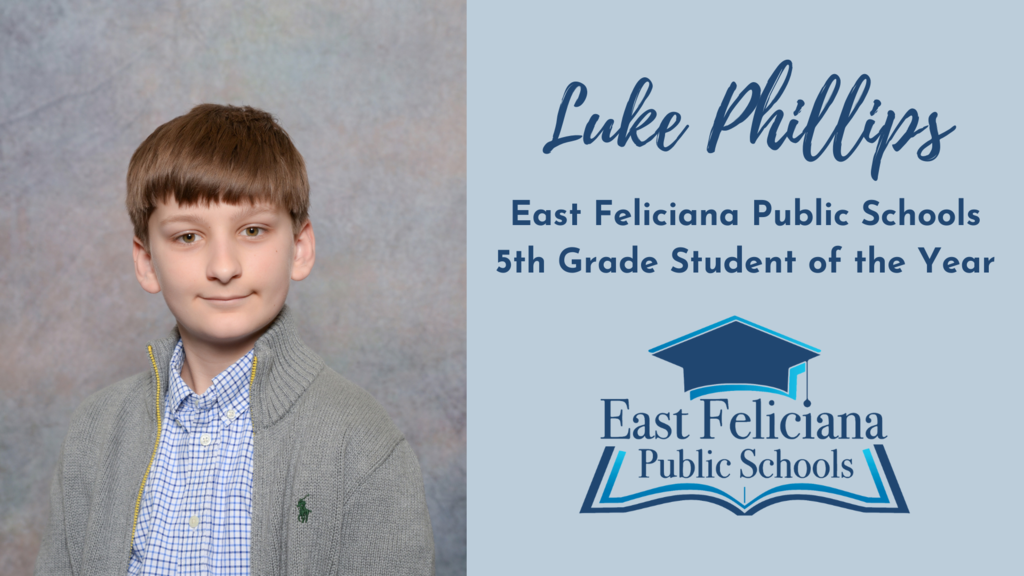 A child in an unzipped gray sweater and blue checkered shirt smiles without teeth in front of a portrait backdrop. To the right of him is the East Feliciana Public Schools graduation cap logo and his name and title: Luke Phillips, East Feliciana Public Schools 5th Grade Student of the Year.