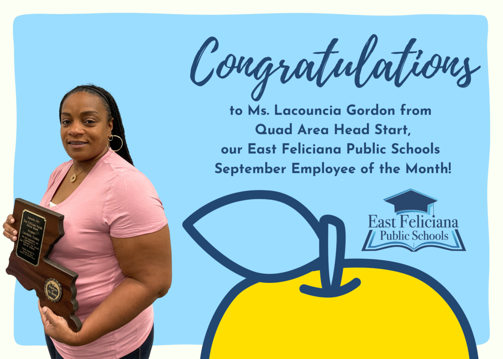 A woman wearing a pink shirt is holding a plaque shaped like Louisiana. She stands in front of a light blue backdrop with a cartoon yellow apple and the East Feliciana Public Schools graduation cap logo. Text on the background reads "Congratulations to Ms. Lacouncia Gordon from Quad Area Head Start, our East Feliciana Public Schools September Employee of the Month!