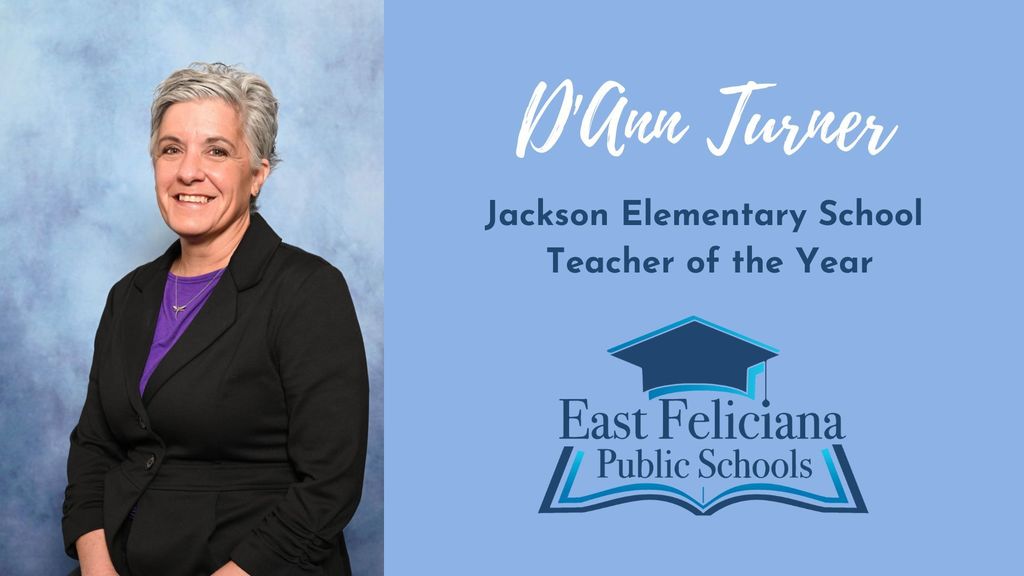 A woman in a black jacket and purple shirt is against a blue backdrop with text that reads D’Ann Turner Jackson Elementary School Teacher of the Year and the East Feliciana Public Schools graduation cap logo